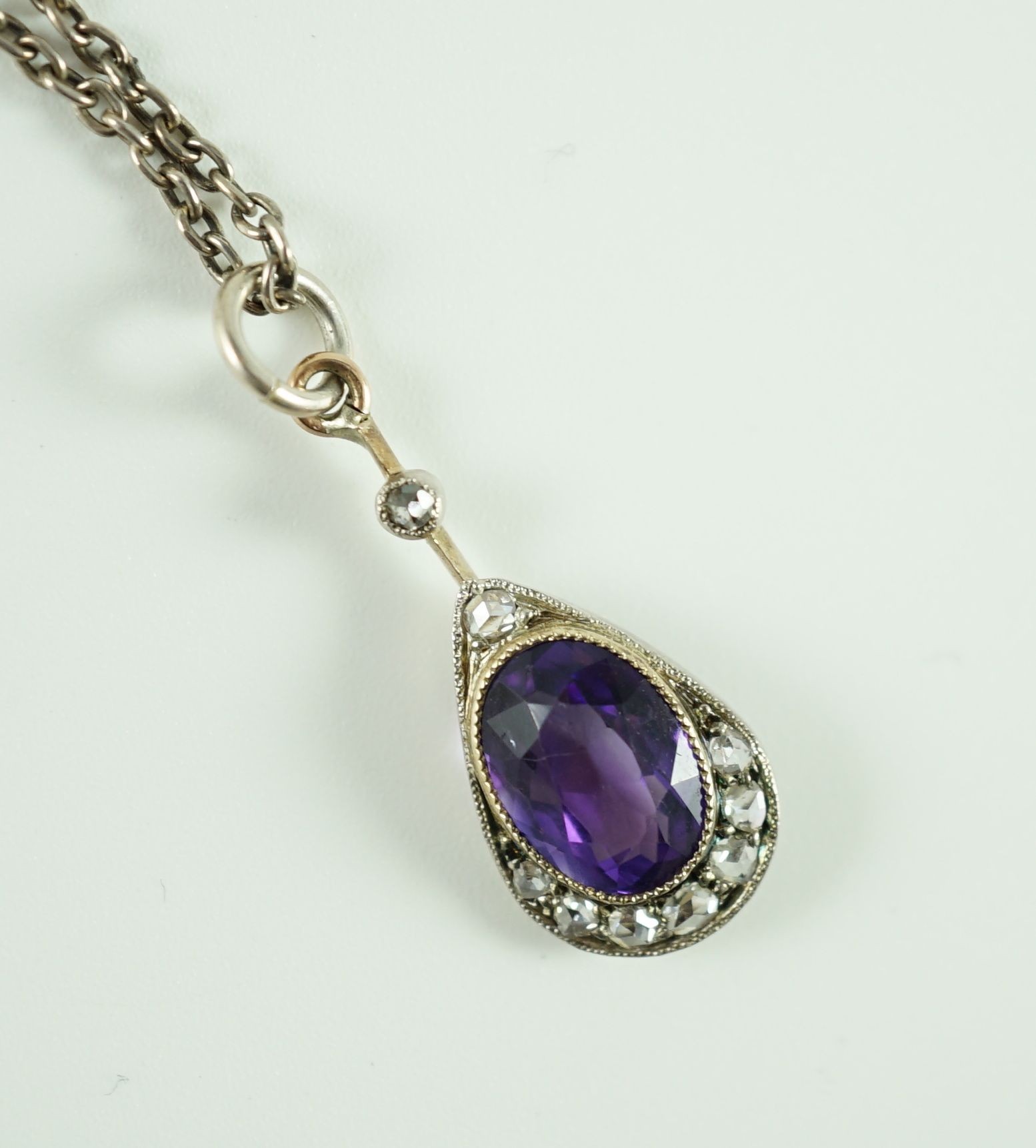 A Victorian gold and silver, amethyst and diamond set teardrop shaped pendant